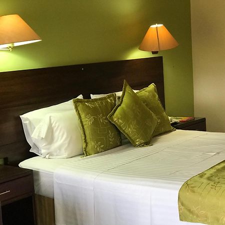 Casa Morales Hotel Internacional Y Centro De Convenciones Ibagué Εξωτερικό φωτογραφία A bedroom at the hotel
