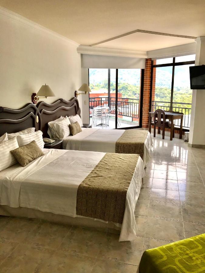 Casa Morales Hotel Internacional Y Centro De Convenciones Ibagué Δωμάτιο φωτογραφία