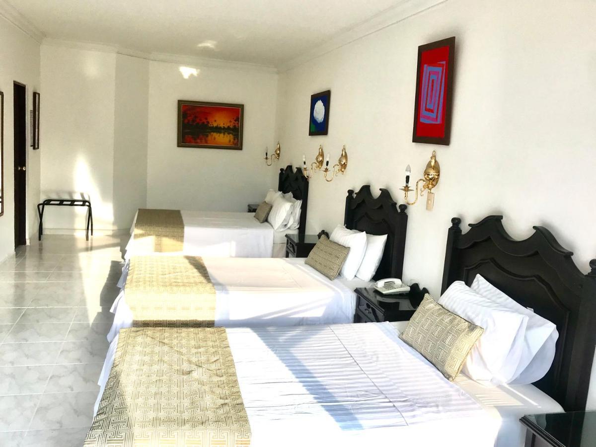 Casa Morales Hotel Internacional Y Centro De Convenciones Ibagué Δωμάτιο φωτογραφία