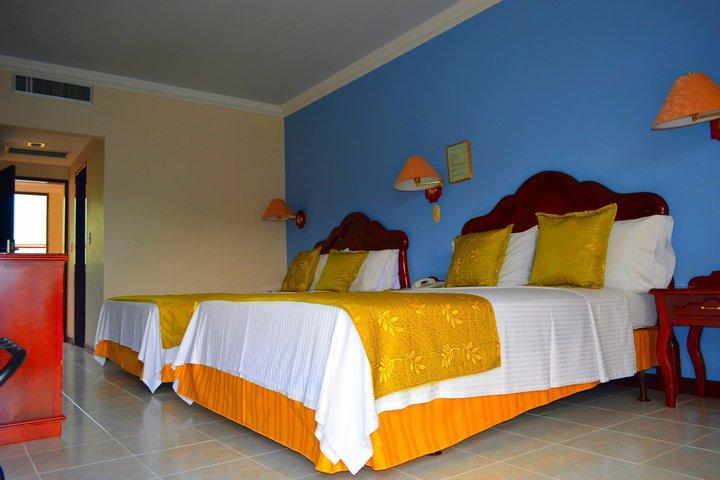 Casa Morales Hotel Internacional Y Centro De Convenciones Ibagué Εξωτερικό φωτογραφία A room at the hotel